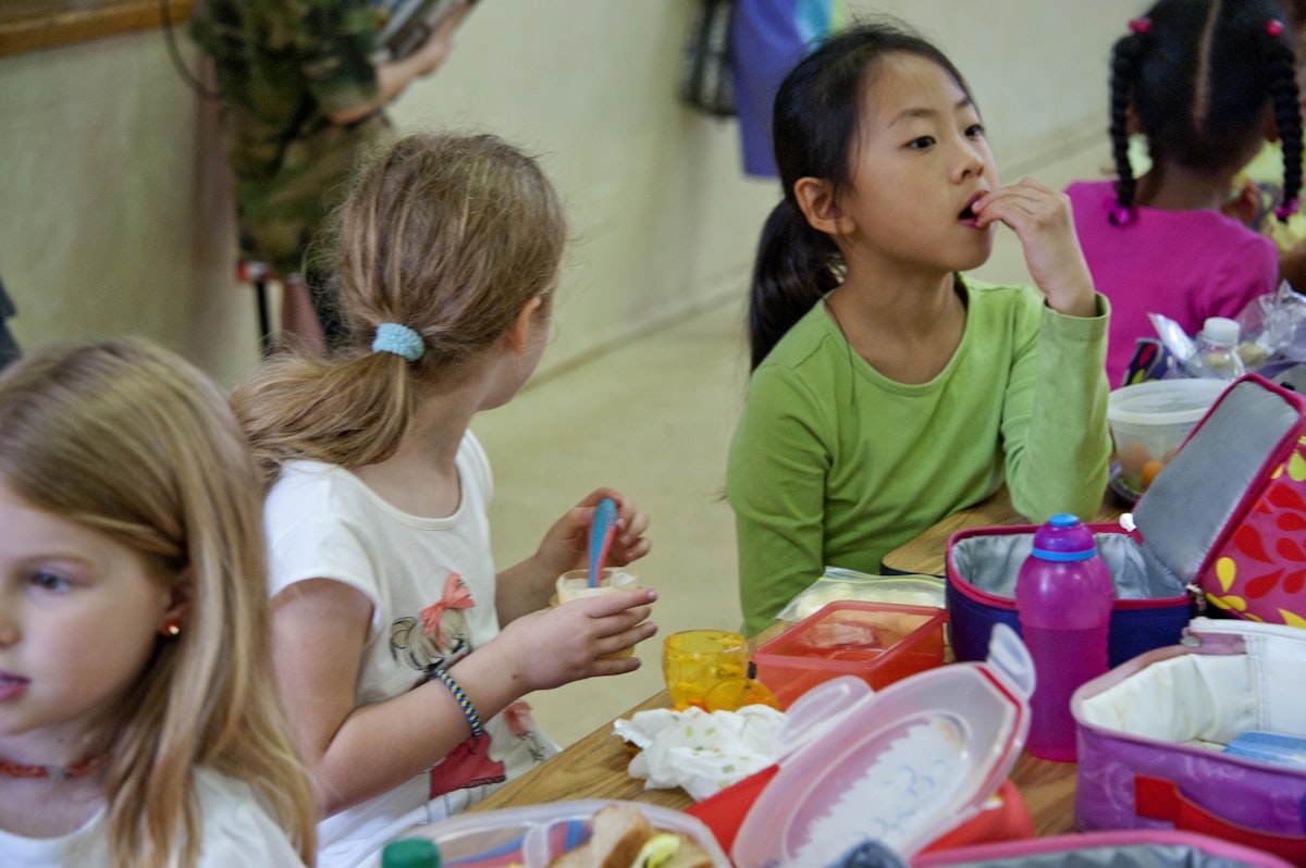 Pediatric nutrition counseling expert with child